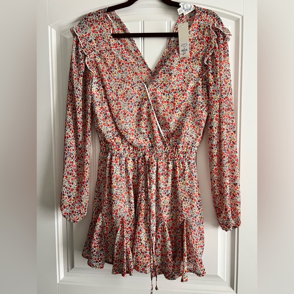Brand new long sleeve spring romper from Francesca’s